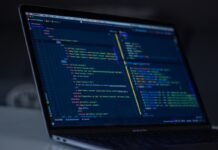 GitHub Breach 2026: 3,800 Repos Exposed — Urgent Warning for VS Code Users GitHub breach 2026 code exposed on developer laptop screen
