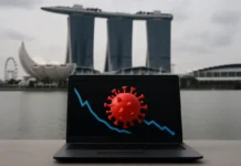 Singapore Cyber Landscape 2025/2026 — a malware infection curve doubling while scam losses decline