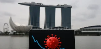 Singapore Cyber Landscape 2025/2026 — a malware infection curve doubling while scam losses decline
