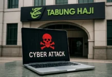 Malaysian pilgrims' fund system outage recovery desk scene representing the Tabung Haji cyberattack response and depositor verification steps