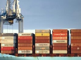 Chinese Port Giant ZPMC Caught in a 38-Company Ransom Threat ZPMC container cranes at a port terminal at dusk — the port machinery maker named on the n0n 38-company ransom leak list